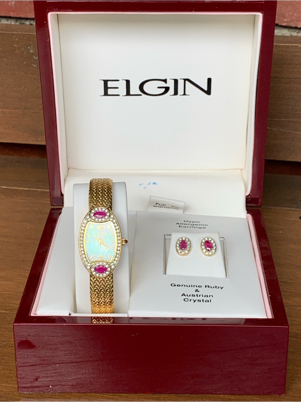 In Box Elgin gold watch with ruby and crystal with matching earrings